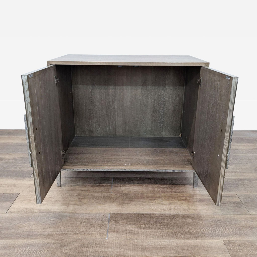 Open Reperch cabinet showing interior with metal base.