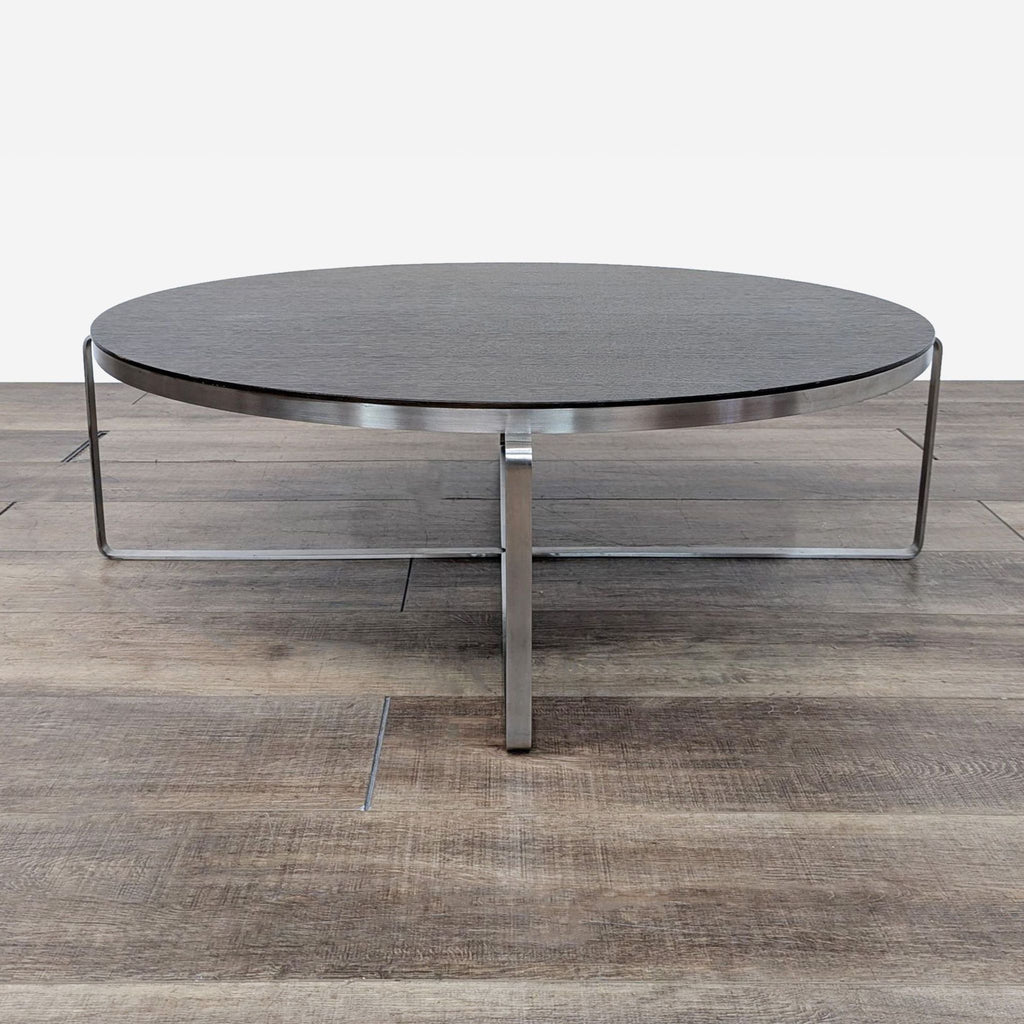 a coffee table with a steel base.