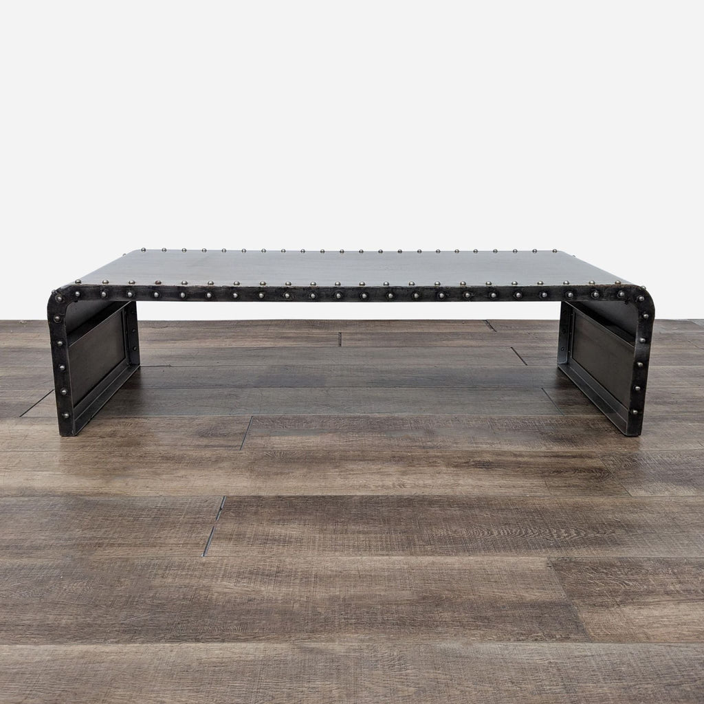 the coffee table is made from a metal frame.