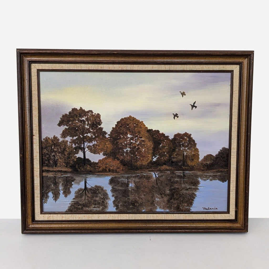 framed oil painting of ducks in a lake