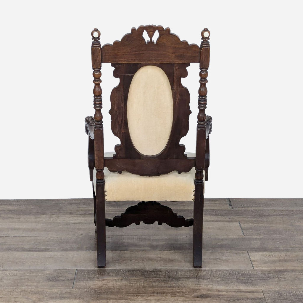 a spanish colonial style carved wood chair