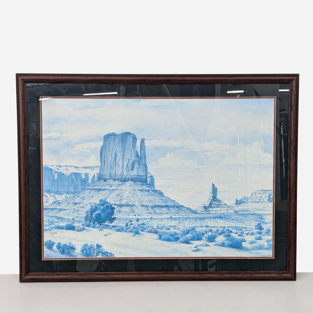 a framed print of a mountain landscape