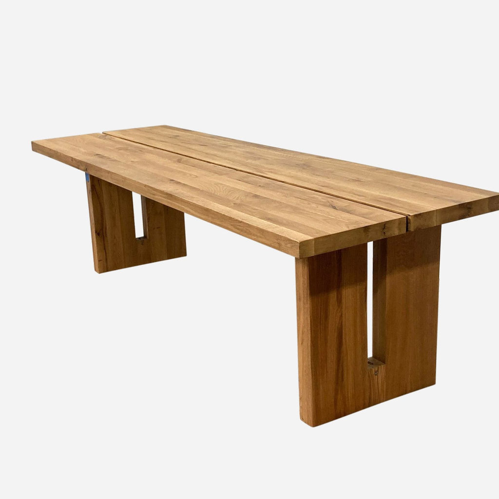 a wooden table with two legs