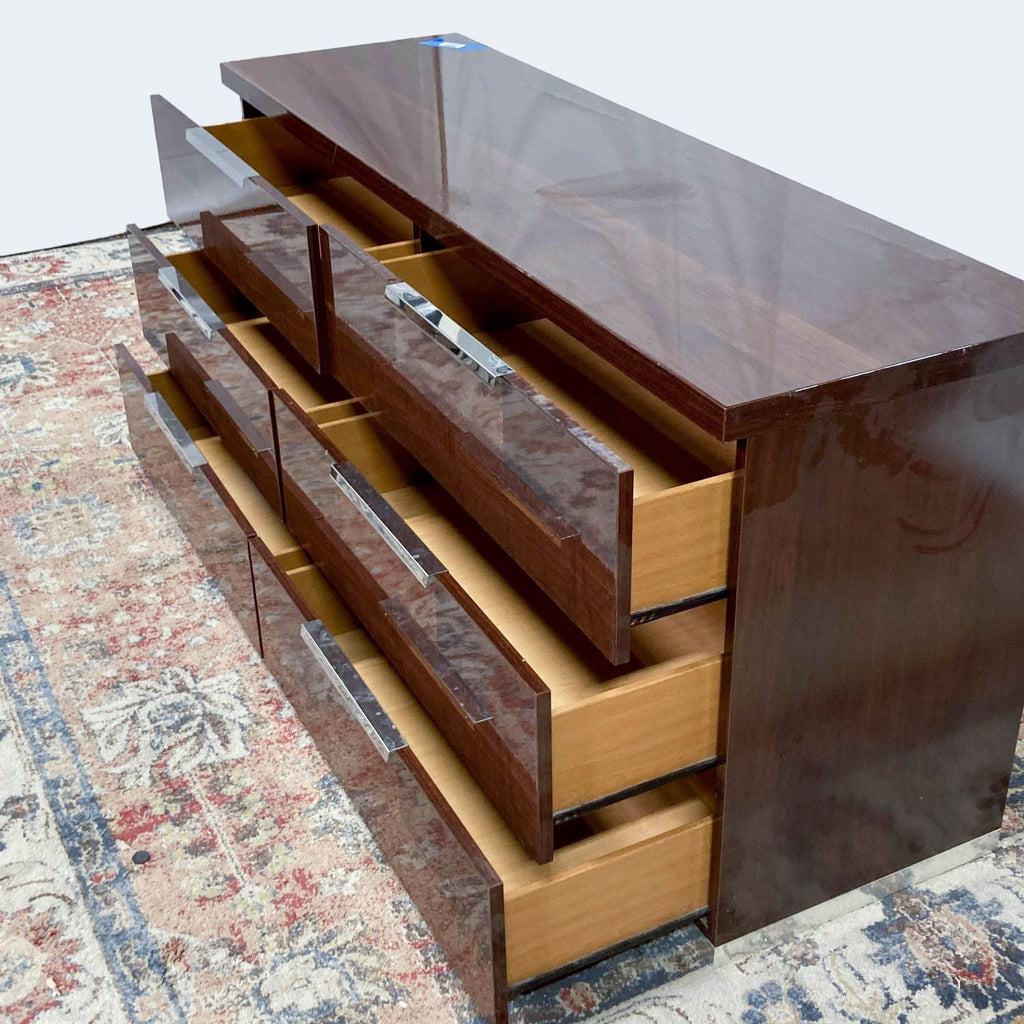 a mid century modern cocktail table in walnut and walnut veneer.