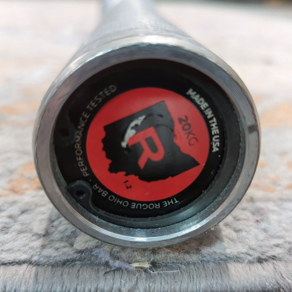 the logo on the metal tube is red and black.