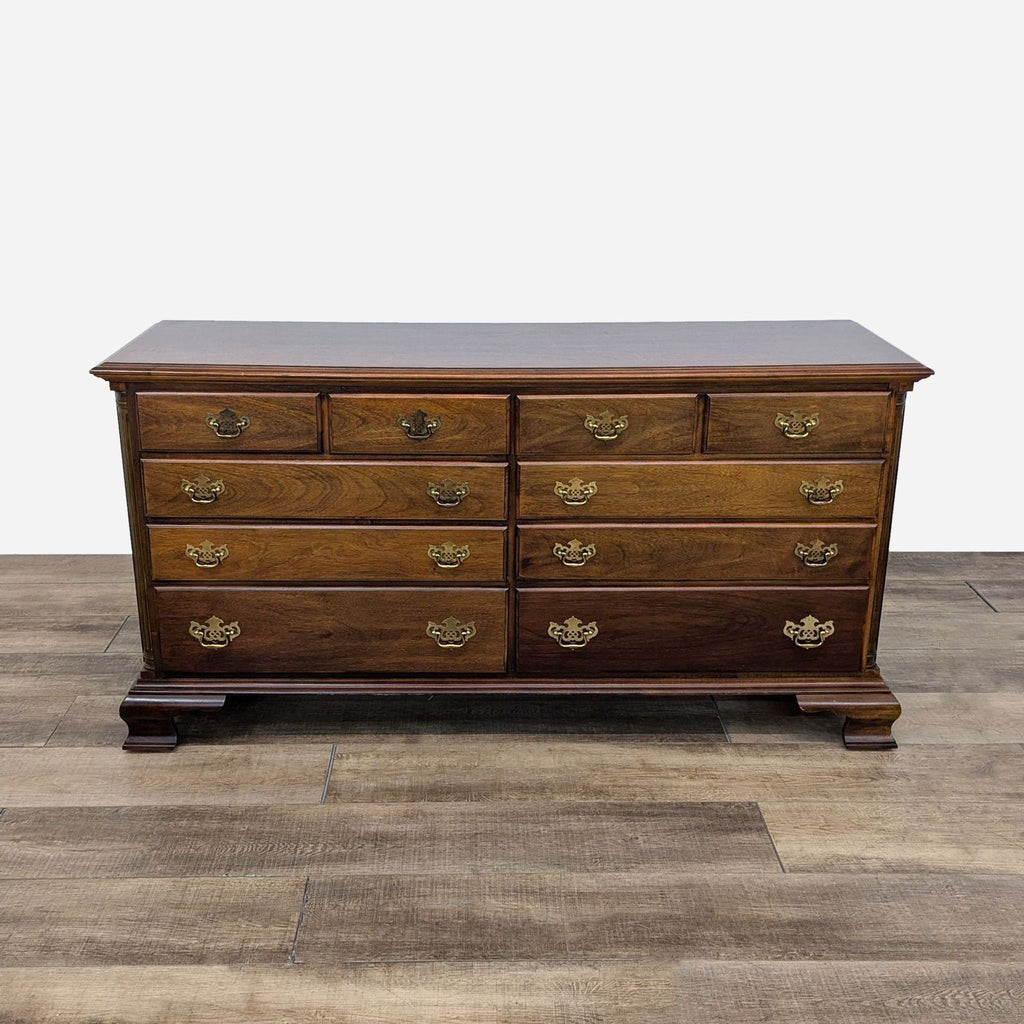 a [ unused0 ] mahogany chest of drawers