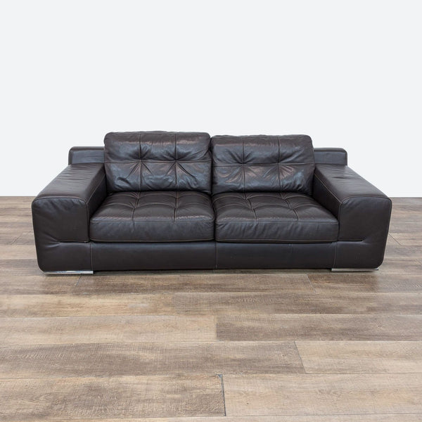 a large leather sofa in a room