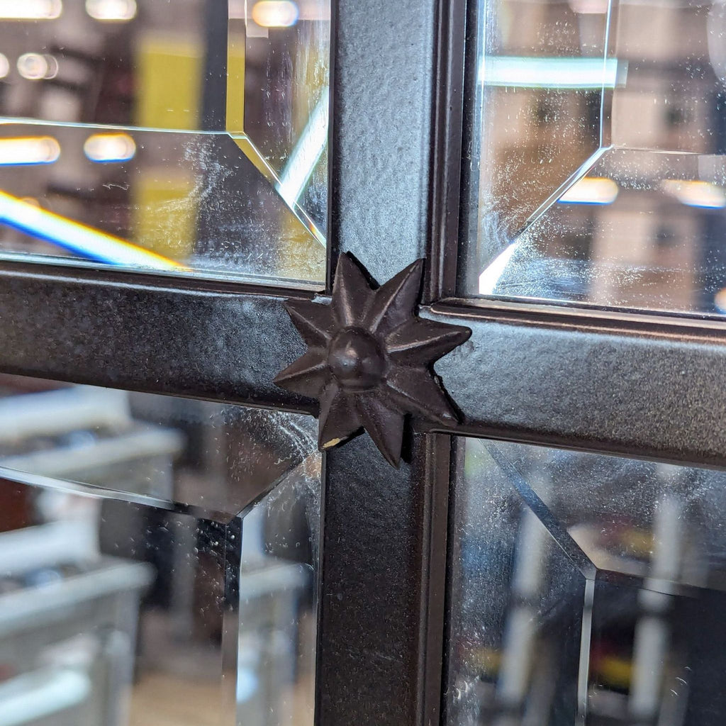 a pair of antique french doors with a metal star on the front.