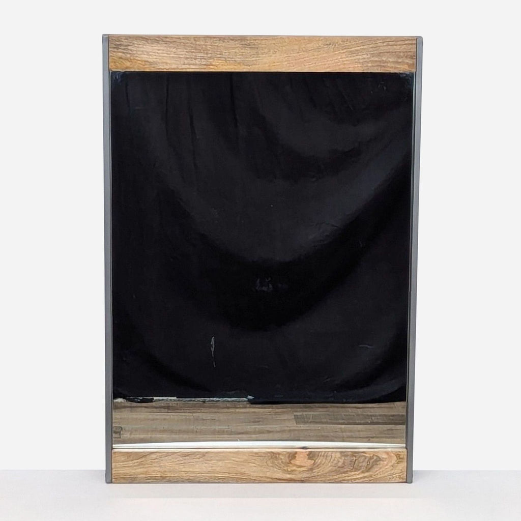 a black and white wood frame with a black cloth on top.