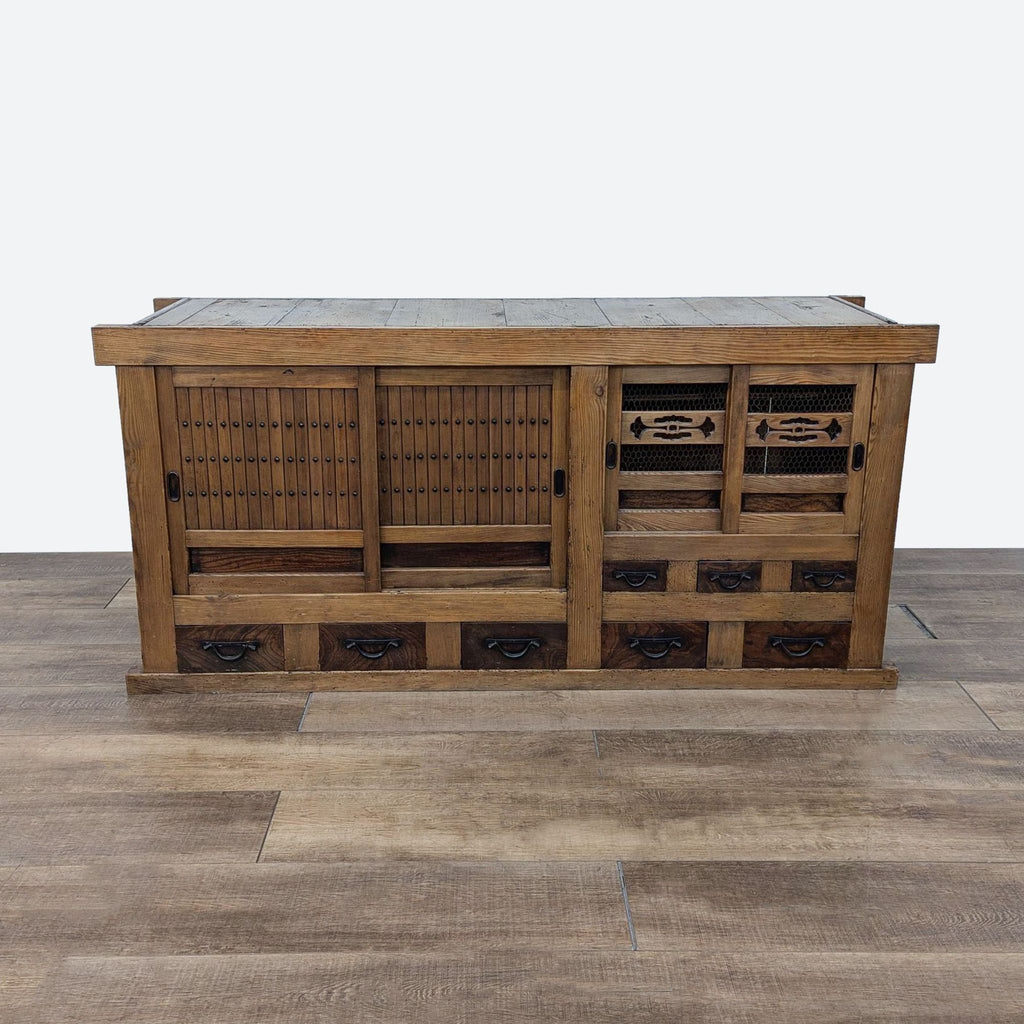 a large chinese teak wood bar with a shelf