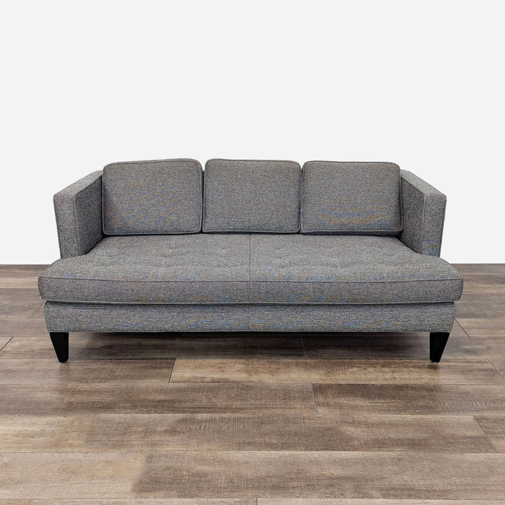 the sofa is a modern sofa that can be used as a sofa or a sofa.