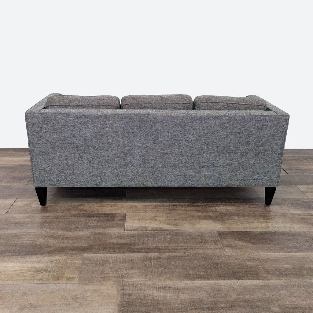 the [ unused0 ] sofa is a modern sofa that is made of wool and has a soft