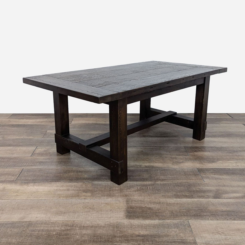 a dark wood table with a black top and a gray top.