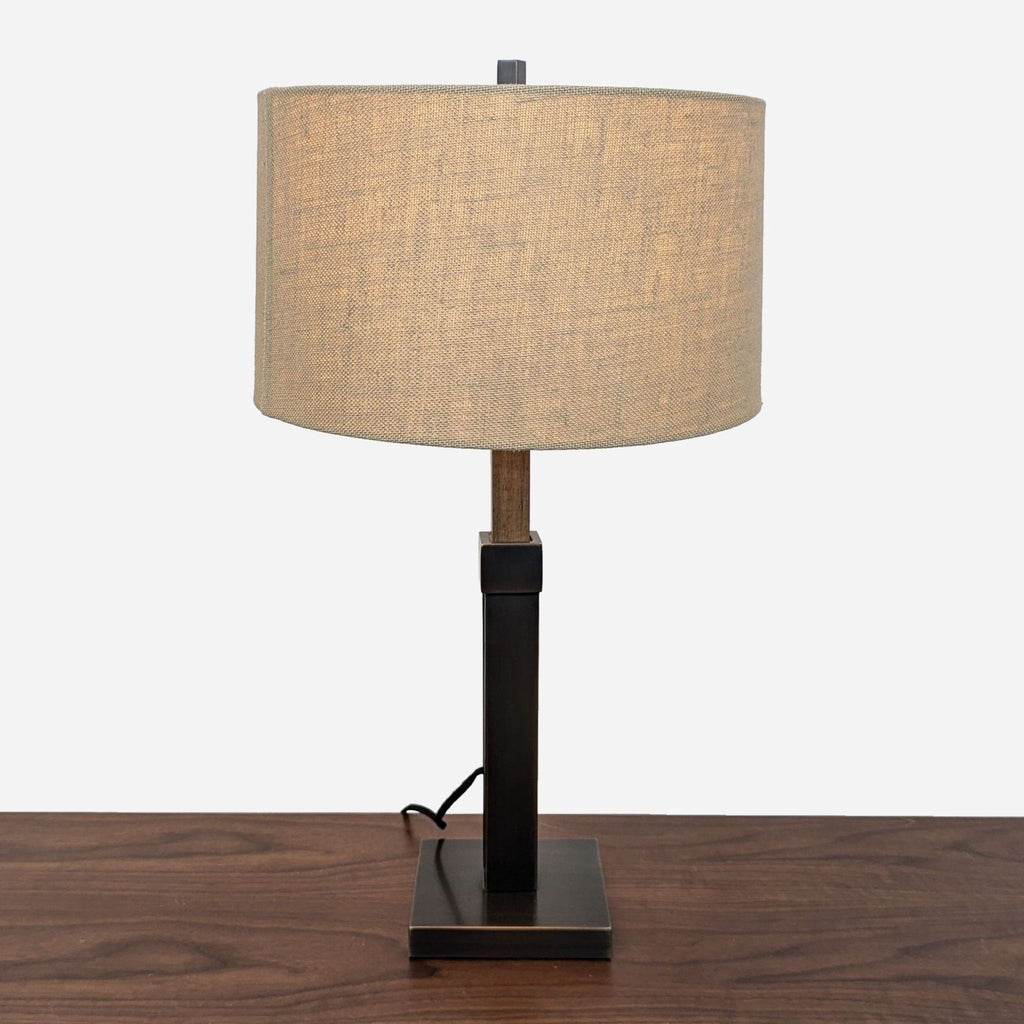 a lamp on a wooden table 