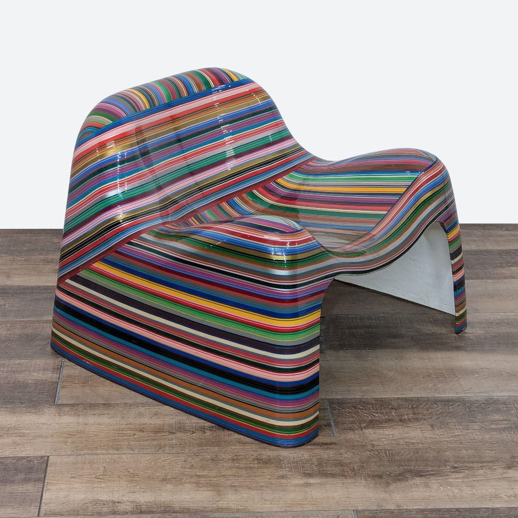 a chair made of plastic, with a striped pattern.