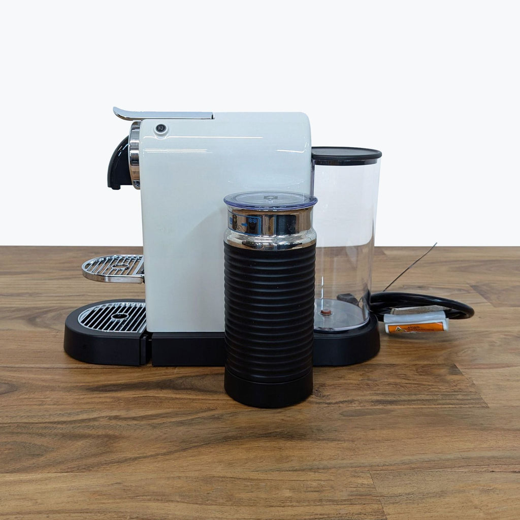the coffee machine is a compact machine that can be used as a coffee machine.
