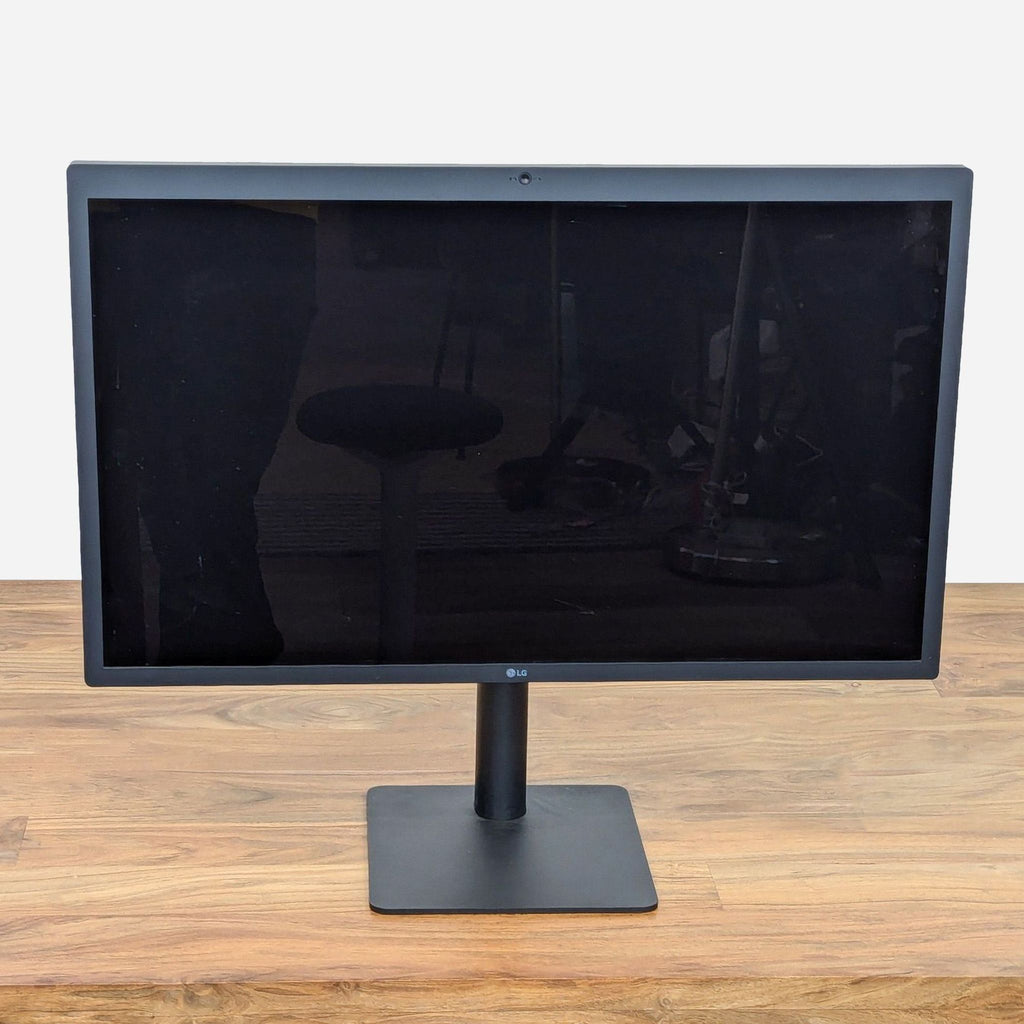 the monitor is a simple, modern design that can be used as a desk.