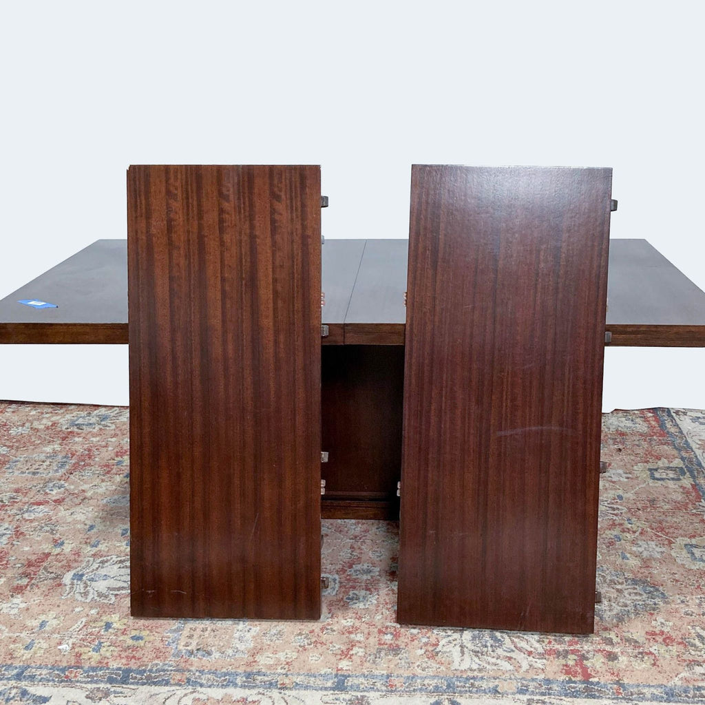 a pair of [ unused0 ] mahogany and ebony dining tables