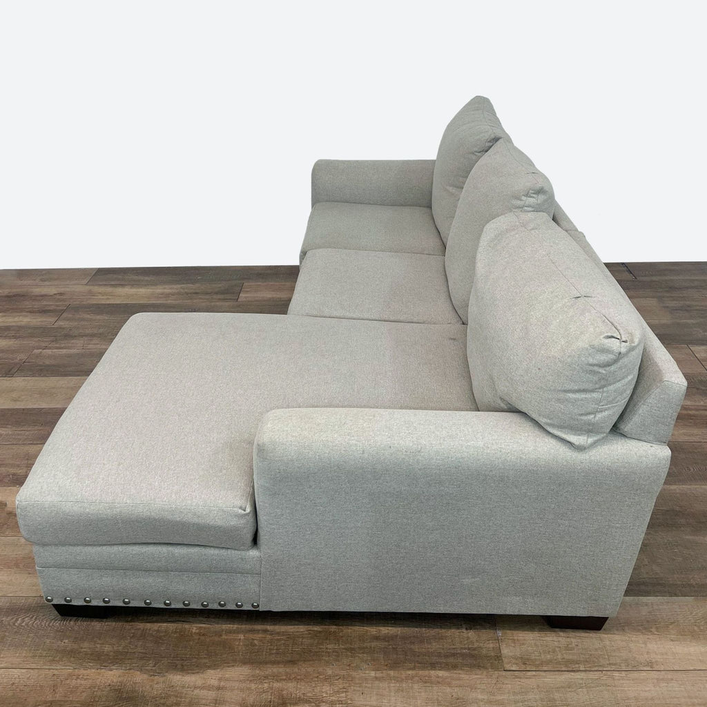 a [ unused0 ] grey fabric sofa