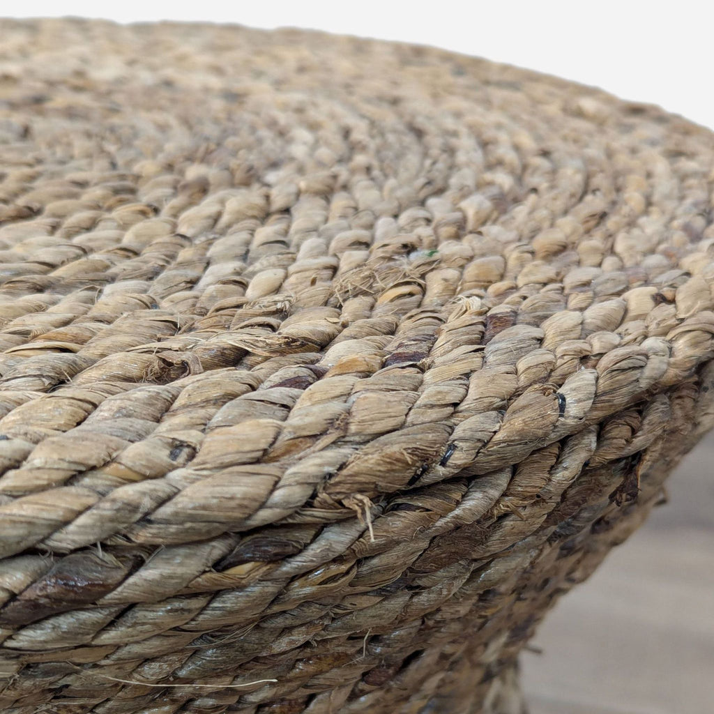 a large, round, natural, and natural seagrass basket.