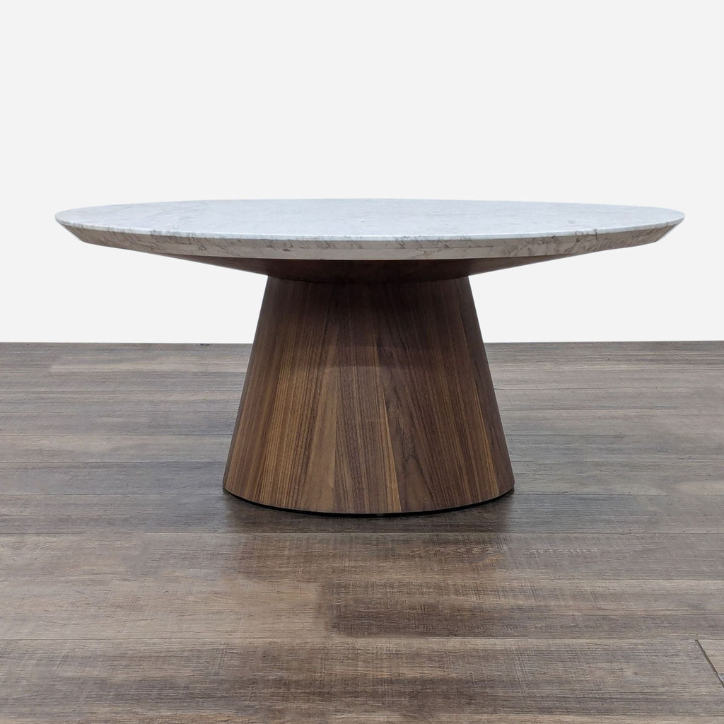 a round table with a marble top.