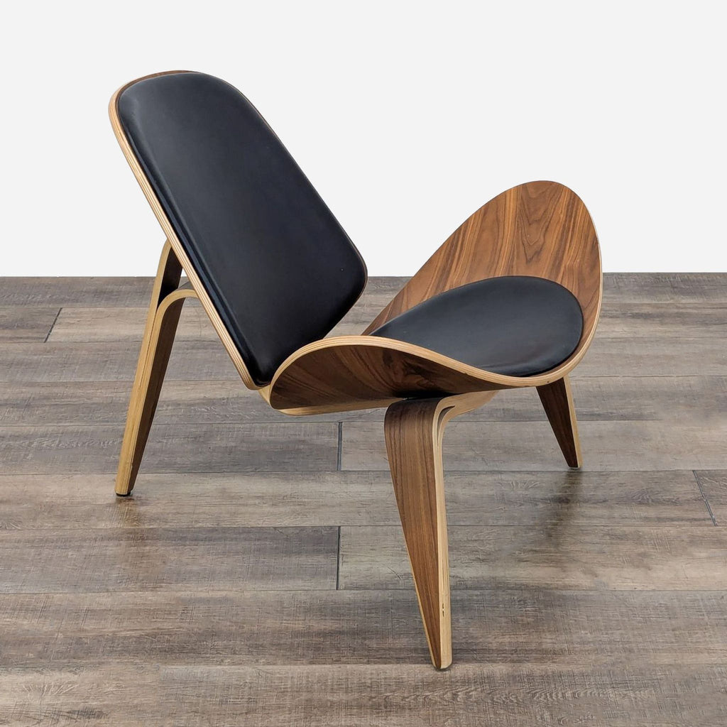 the [ unused0 ] chair by [ unused0 ]