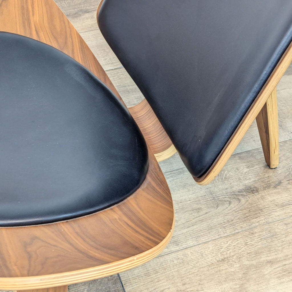 a pair of [ unused0 ] chairs by [ unused0 ] for [ unused0 ],