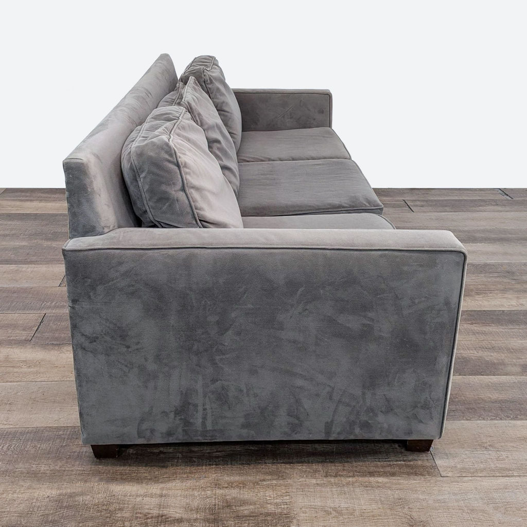 sofa in a grey velvet fabric