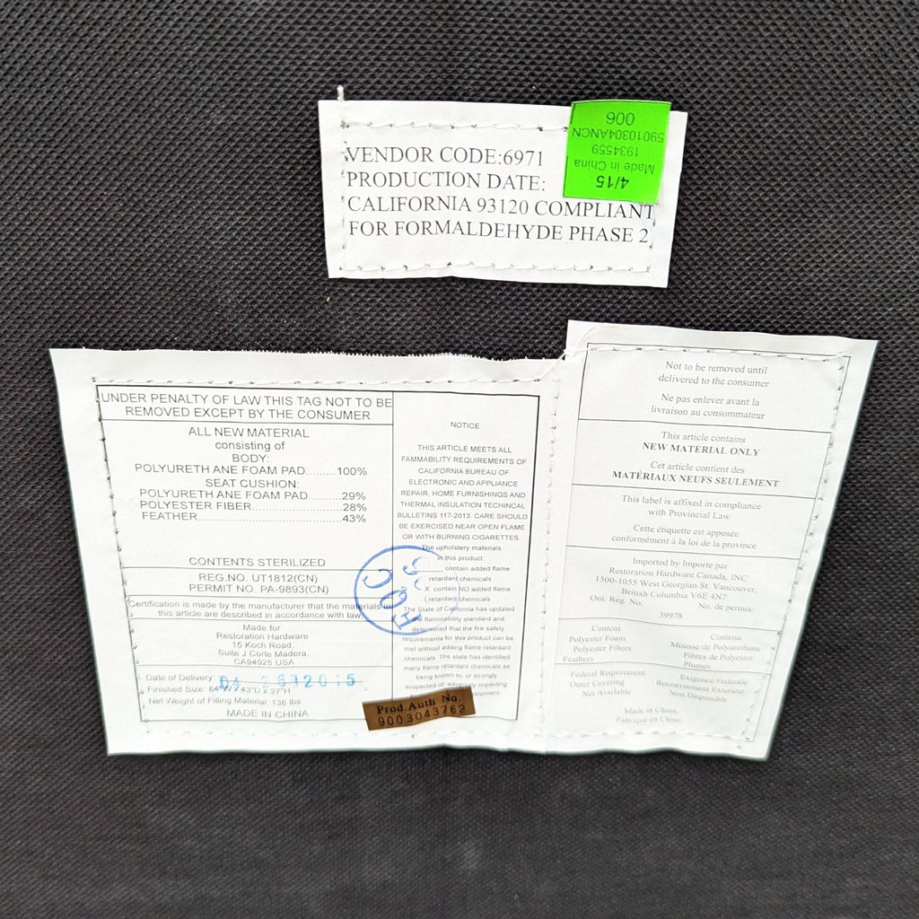 Close-up of the Churchill sofa's label, showing material and compliance details.