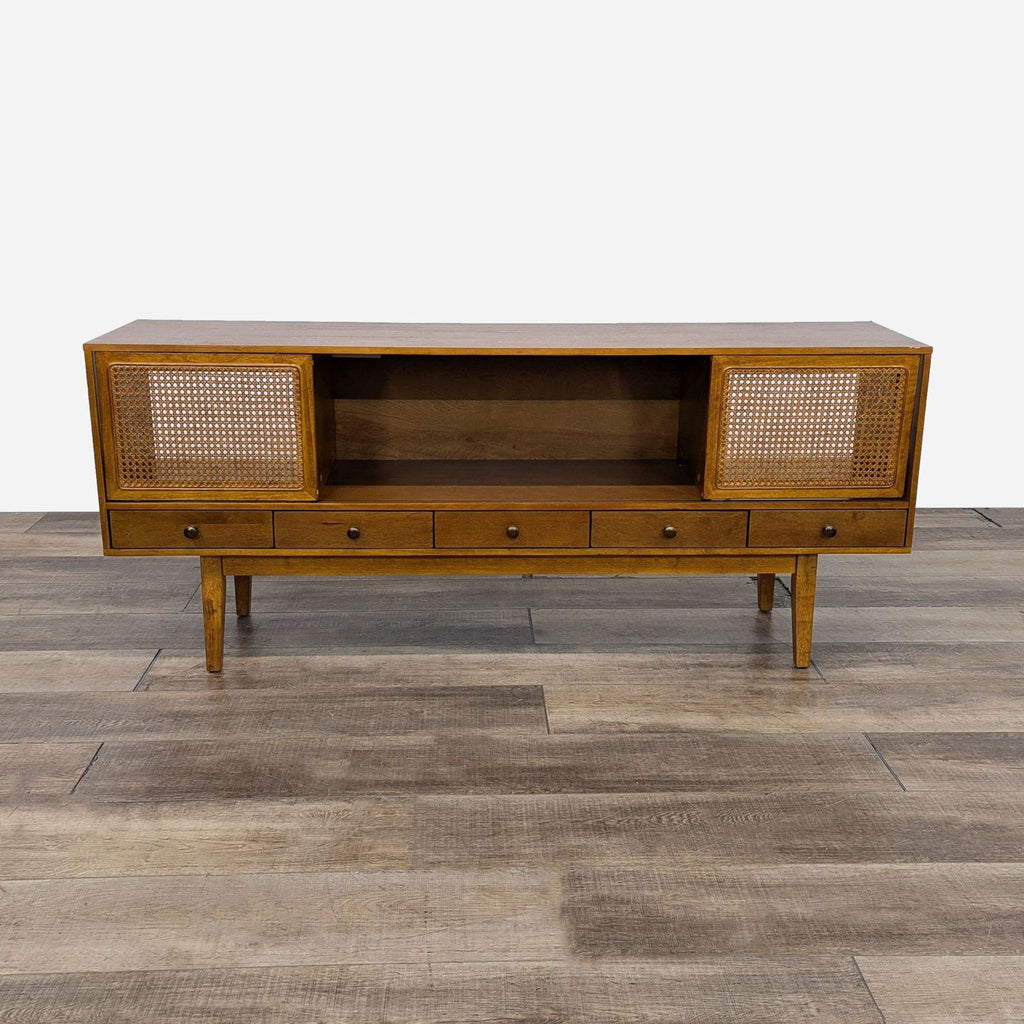 a mid century sideboard with a shelf