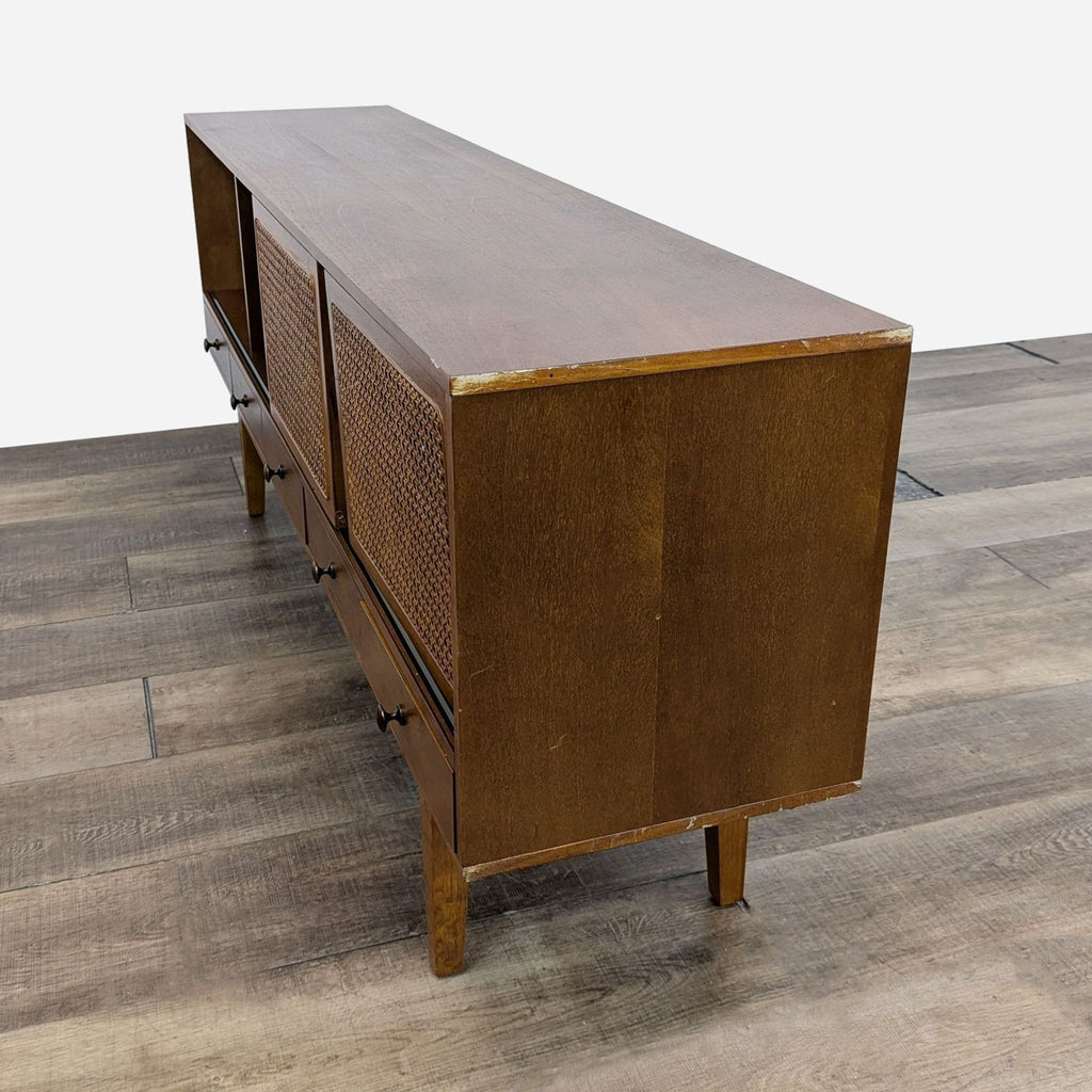 a mid century modern sideboard by [ unused0 ]