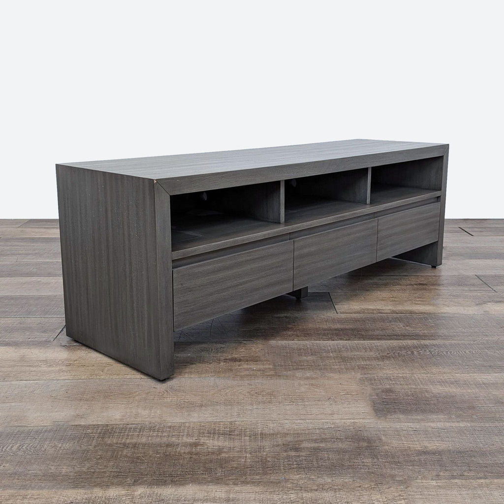 the modern tv stand is made of solid wood with a black finish.