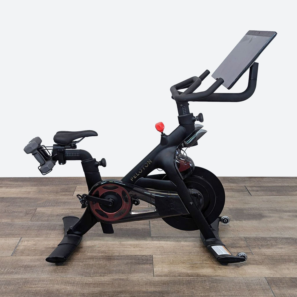 Peloton Exercise Bike with HD Touchscreen and Weights – Premium Fitness Equipment