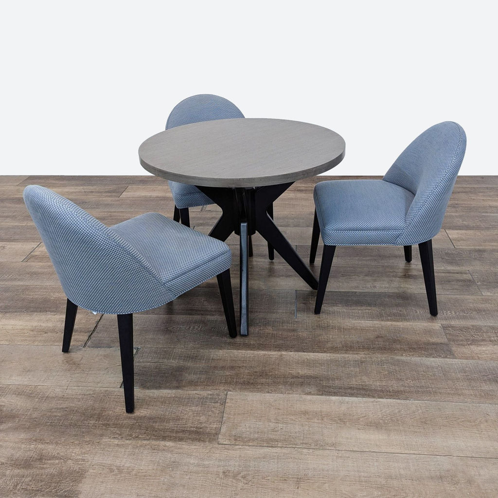 the [ unused0 ] round table with four chairs