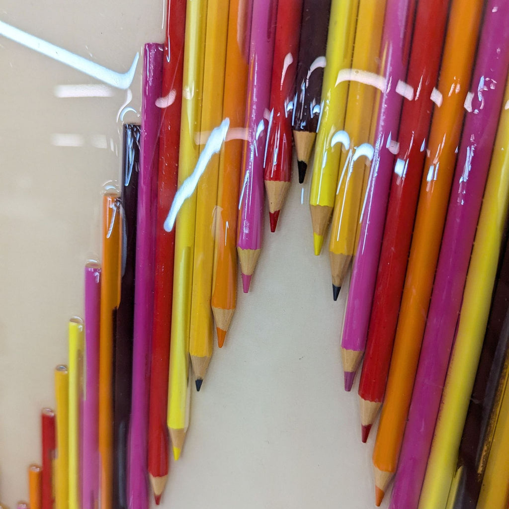 a wall of colored pencils in a store.