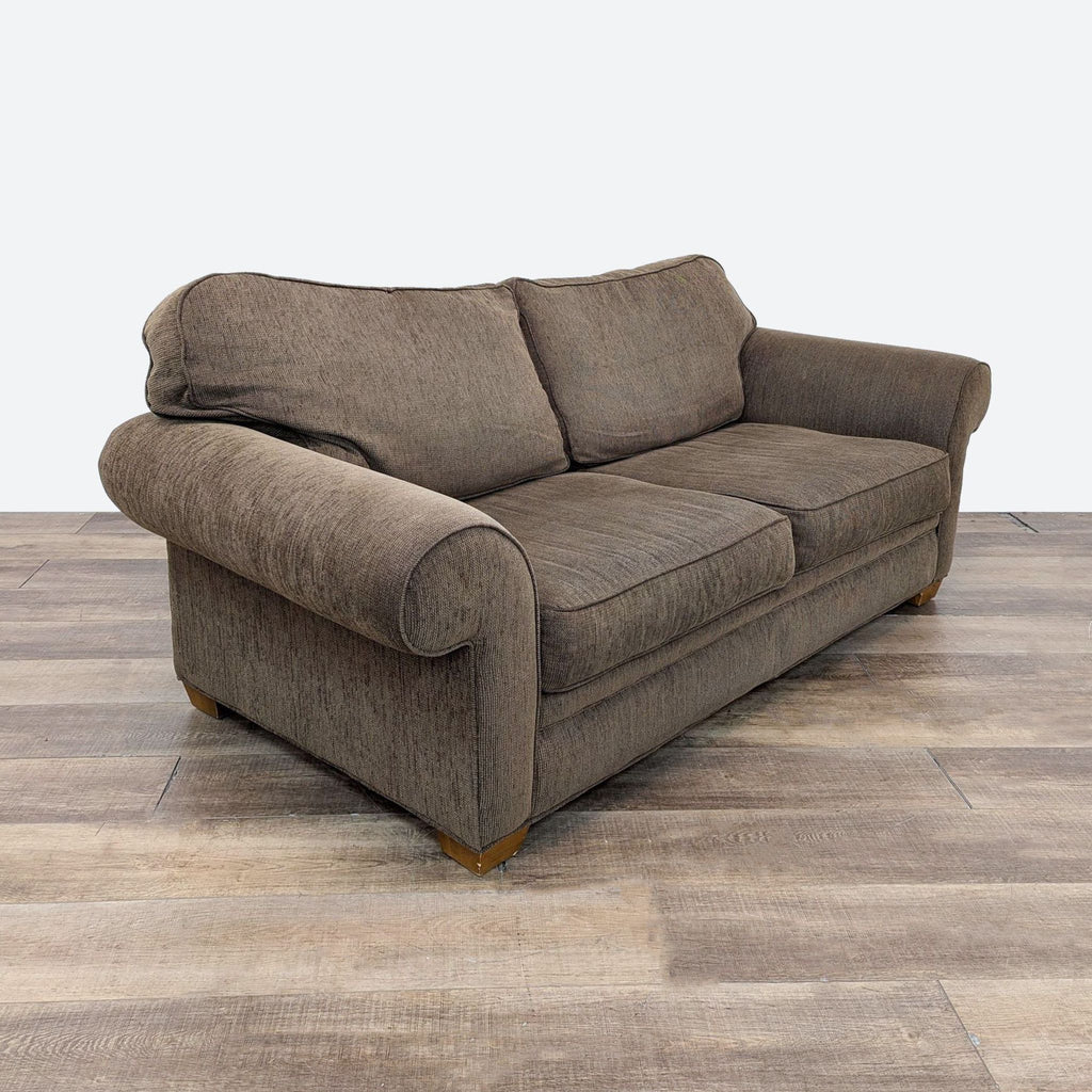 a brown sofa with a wooden base in a modern style. 3d rendering