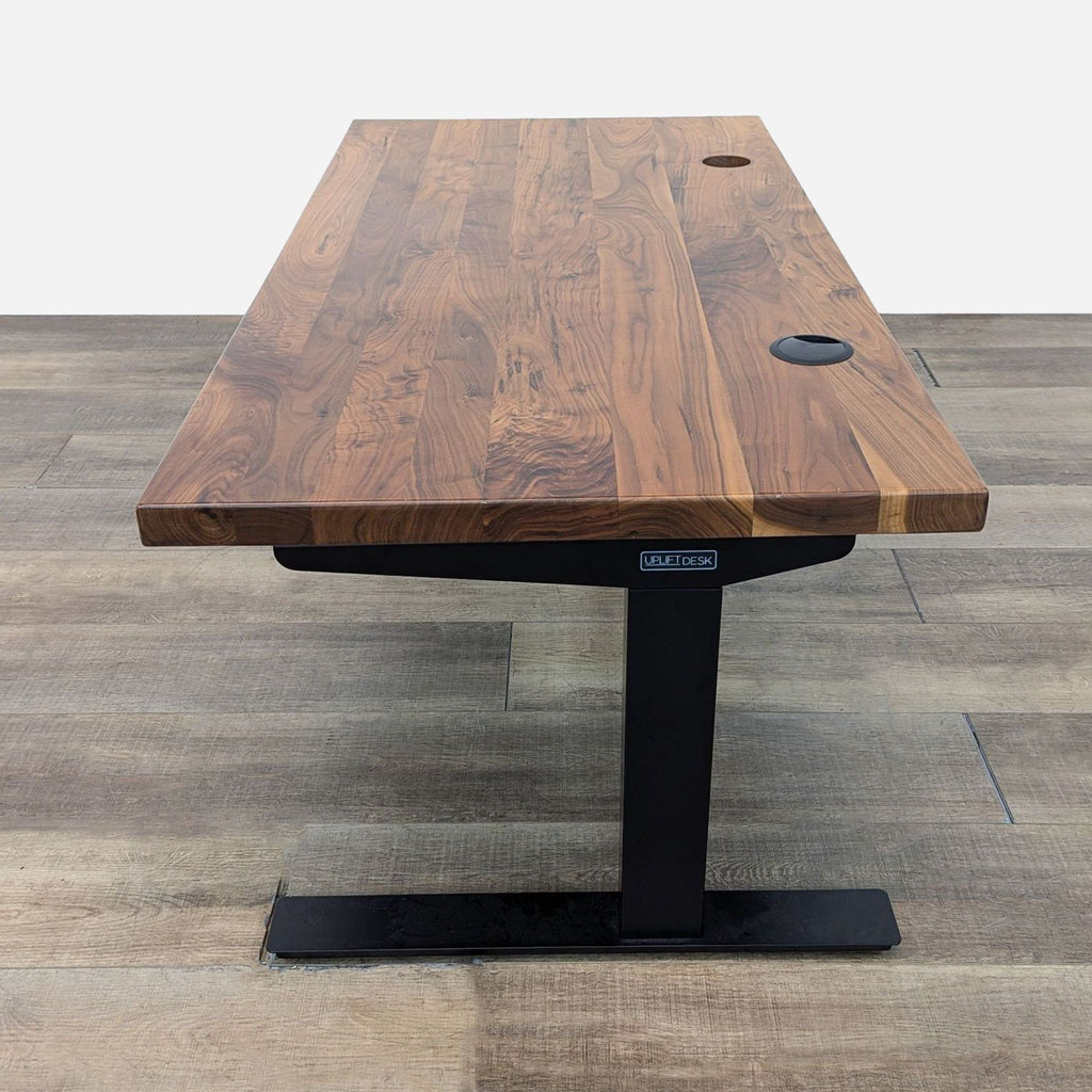 the table is made from a walnut veneer.