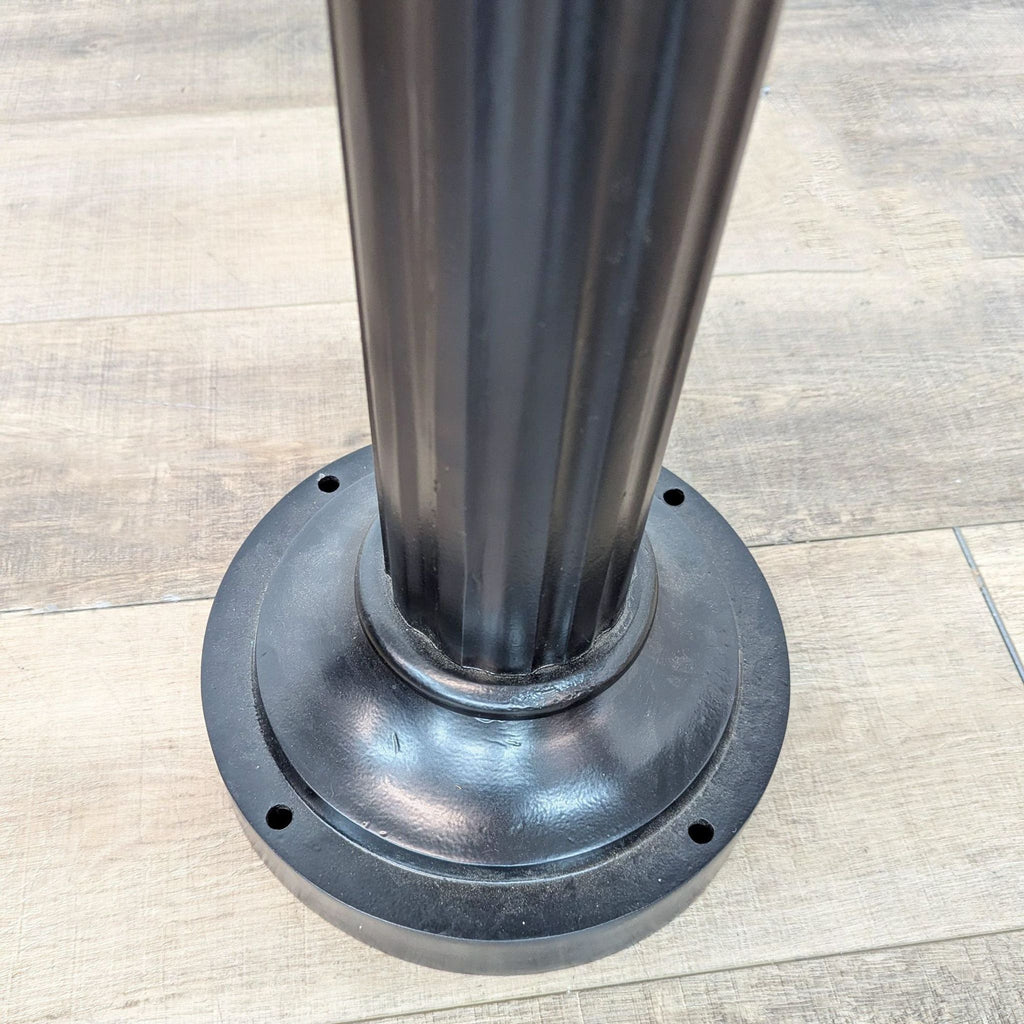 the [ unused0 ] - polished steel pole base