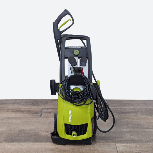 a large vacuum cleaner with a hose