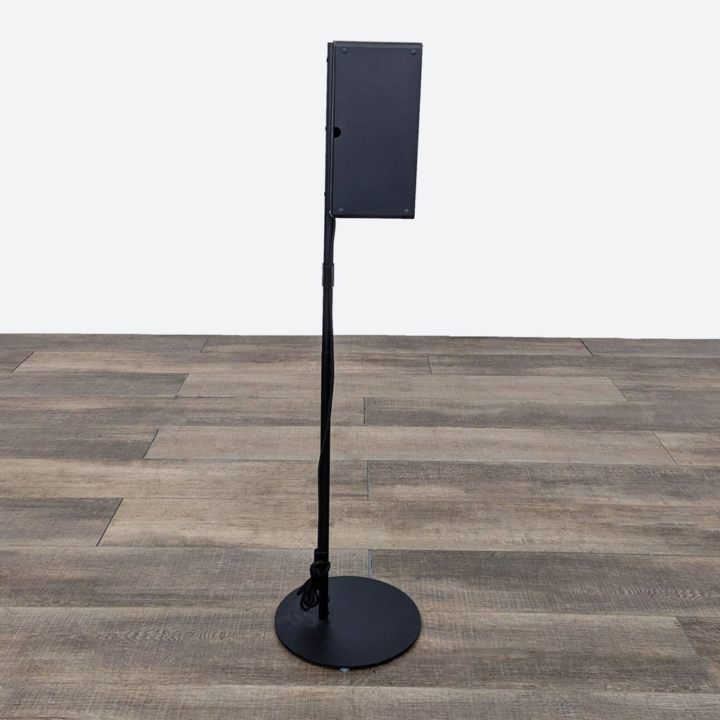 the stand is a stand that can be mounted on a wooden floor.