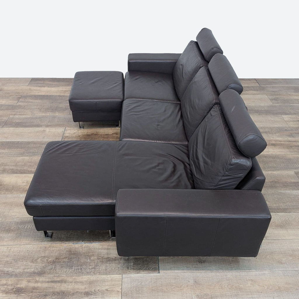 leather sofa with a footstool and footstool