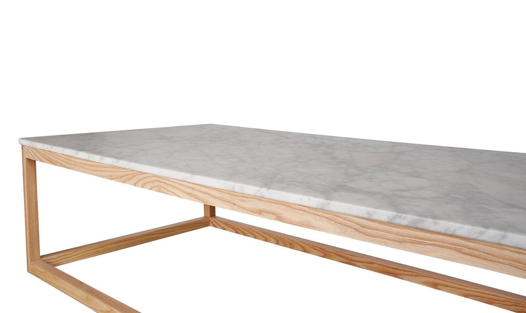 the marble top is a modern take on a modern dining table.