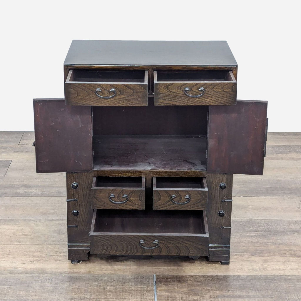 a japanese dark wood desk with two drawers