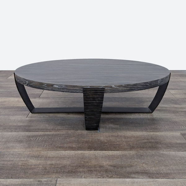 the coffee table is made from a dark wood finish.