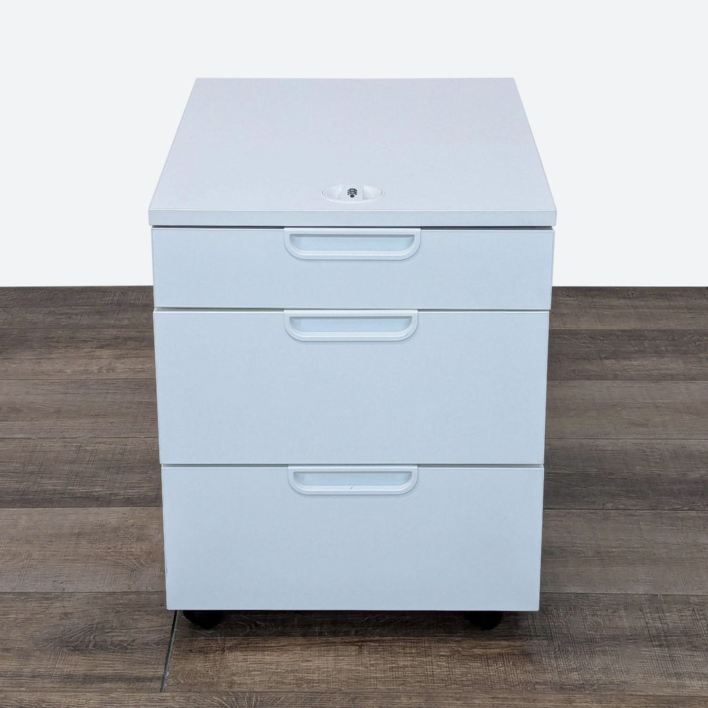 white filing cabinet on a wooden floor