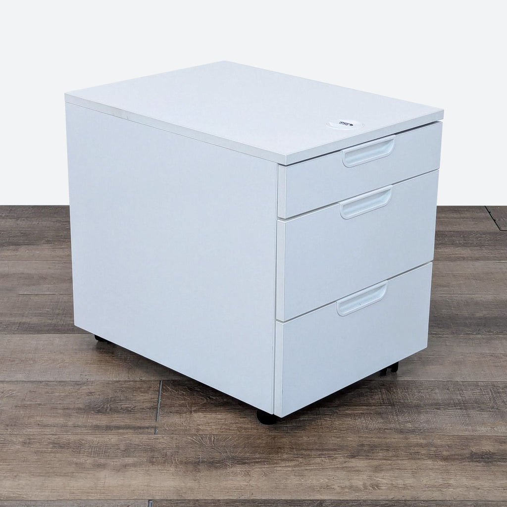 white file cabinet on a wooden floor