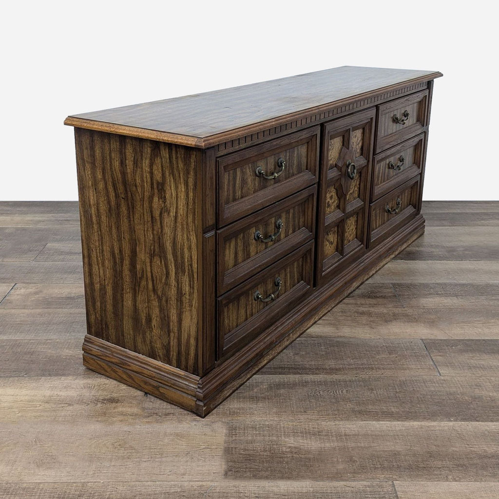 Vintage Wooden Dresser with Central Cabinet and Detailed Drawers