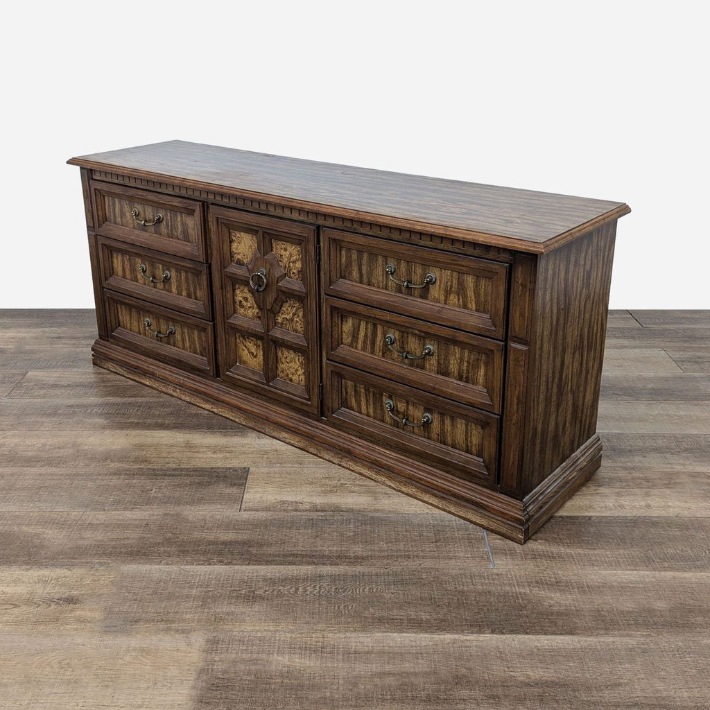 Vintage Wooden Dresser with Central Cabinet and Detailed Drawers