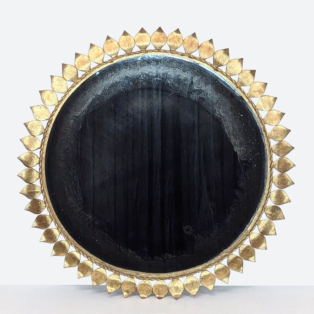 a vintage, antique, antique, black and gold mirror.