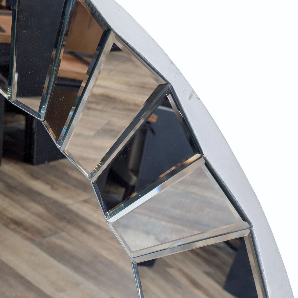 a large mirror with a geometric pattern.